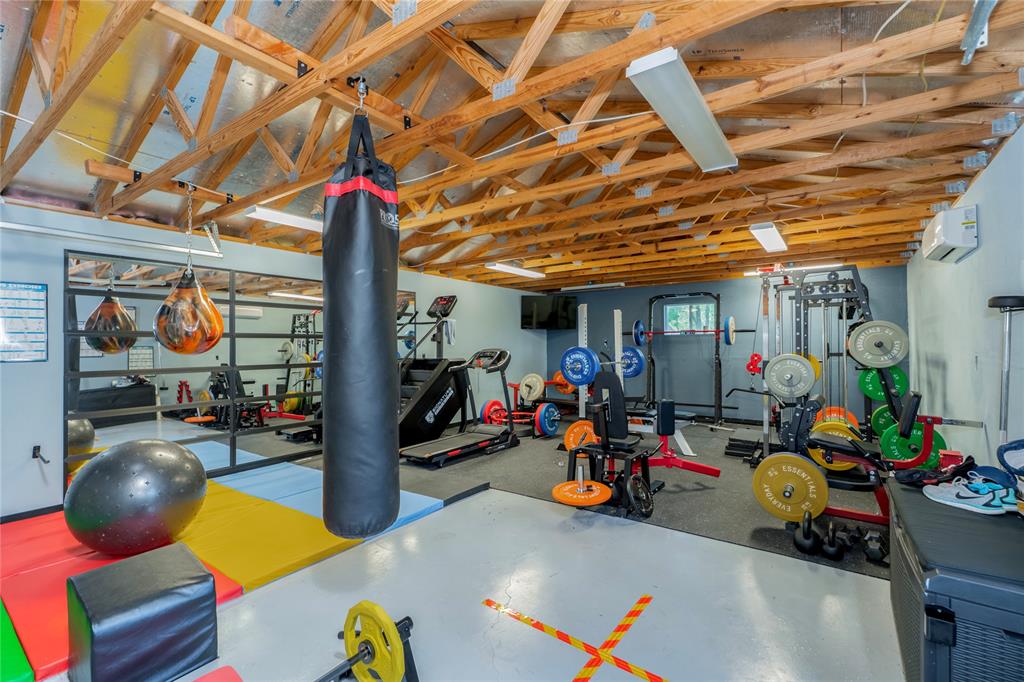 135 Kirkpatrick Road Ennis, TX 75119 - Photo 35 of 40 a view of a room with gym equipment