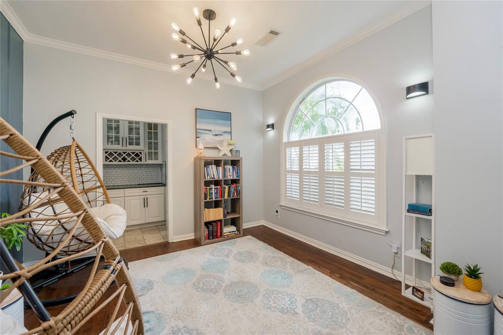 135 Kirkpatrick Road Ennis, TX 75119 - Photo 5 of 40 a view of a livingroom with a window and workspace