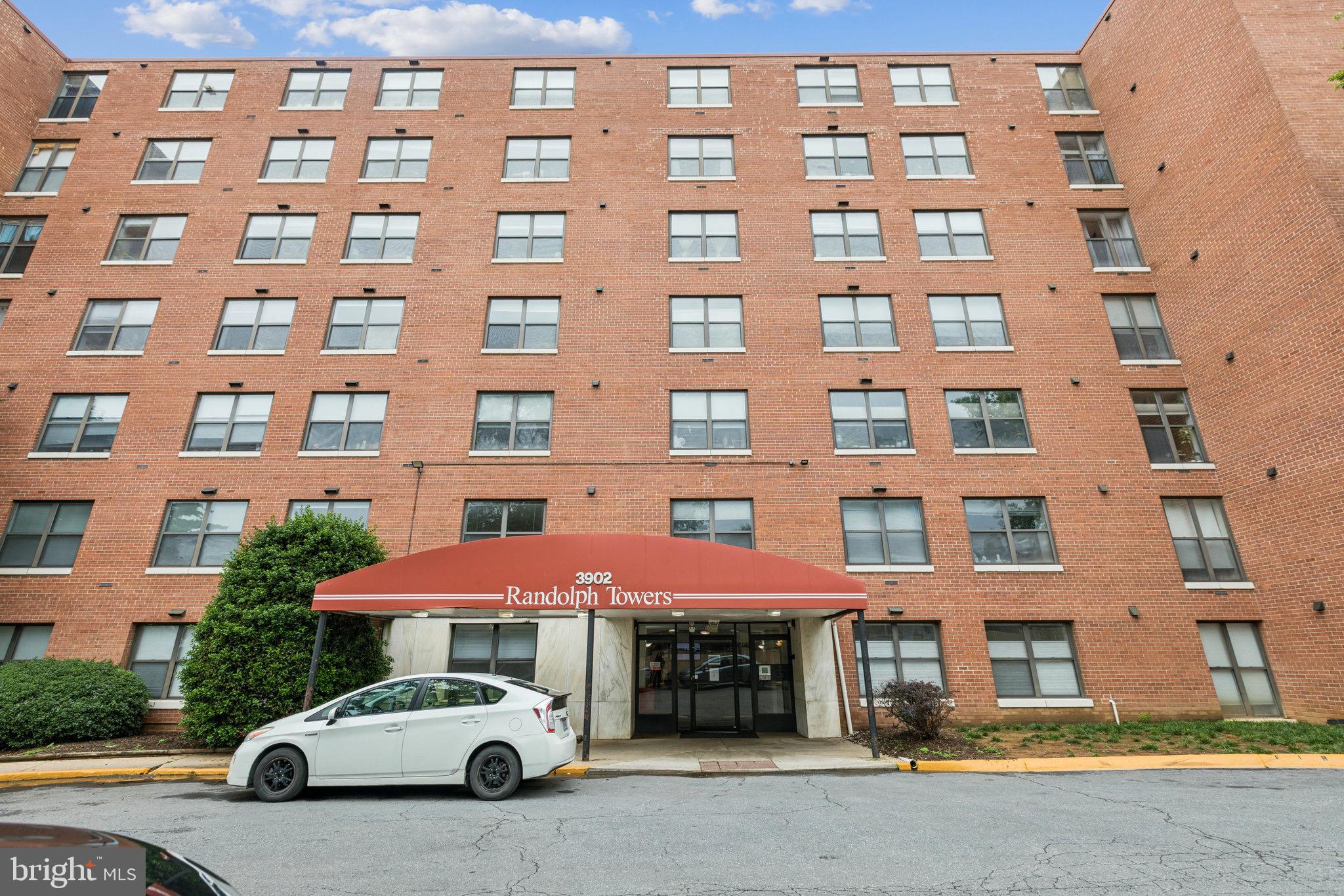 3902 14th Street Northwest, Unit 116 Washington, DC 20011 - Photo 1 of 14 a car parked in front of a building