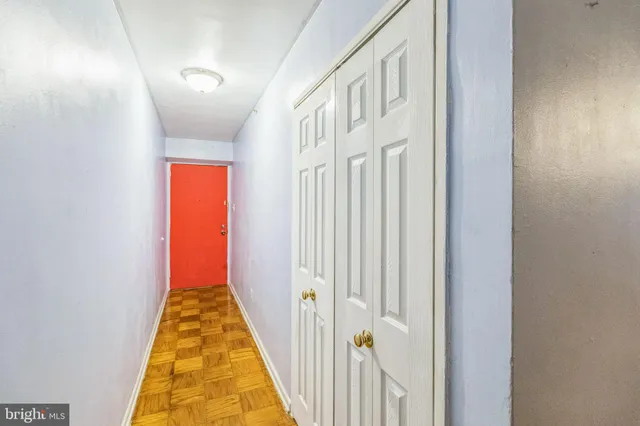 a view of a hallway with windows