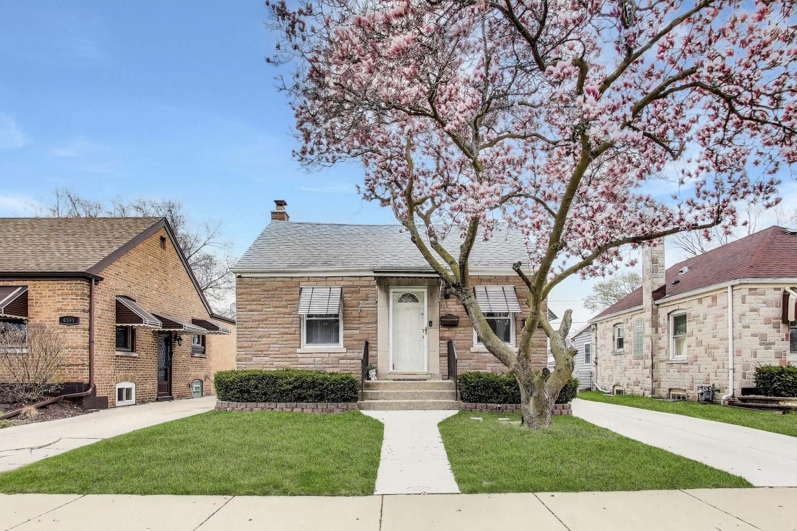 front view of house with a yard