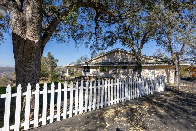 a view of a wooden fence