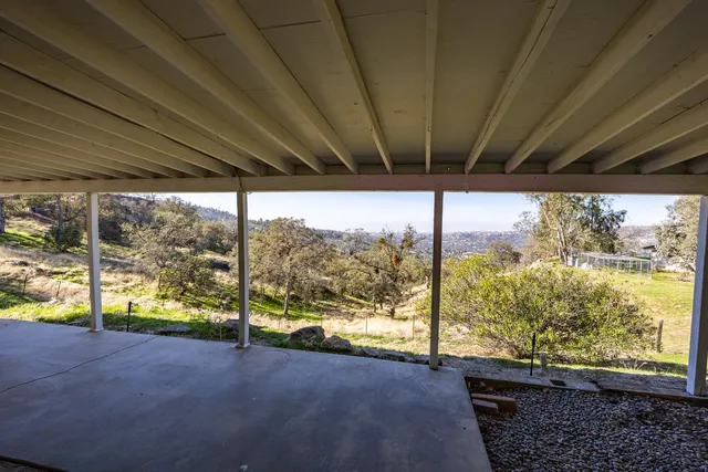 a view of house with outdoor space