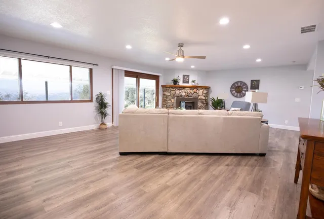 a living room with a couch and a large window