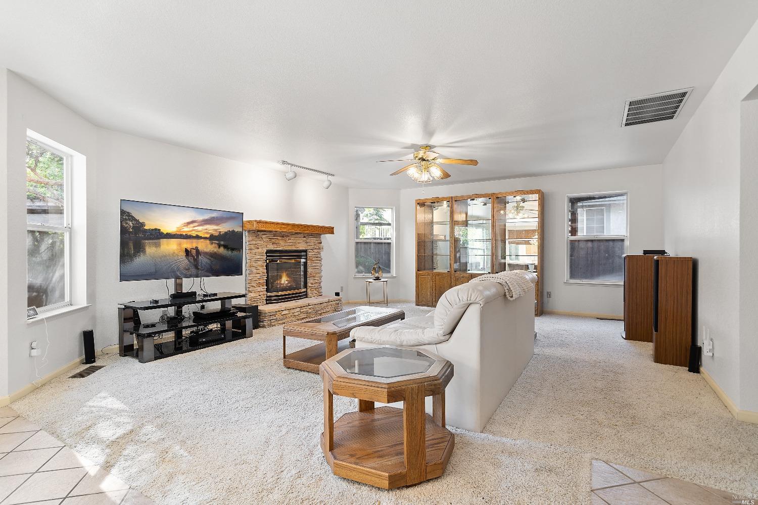 3525 Fieldcrest Avenue Fairfield, CA 94534 - Photo 14 of 31 a living room with furniture and a flat screen tv