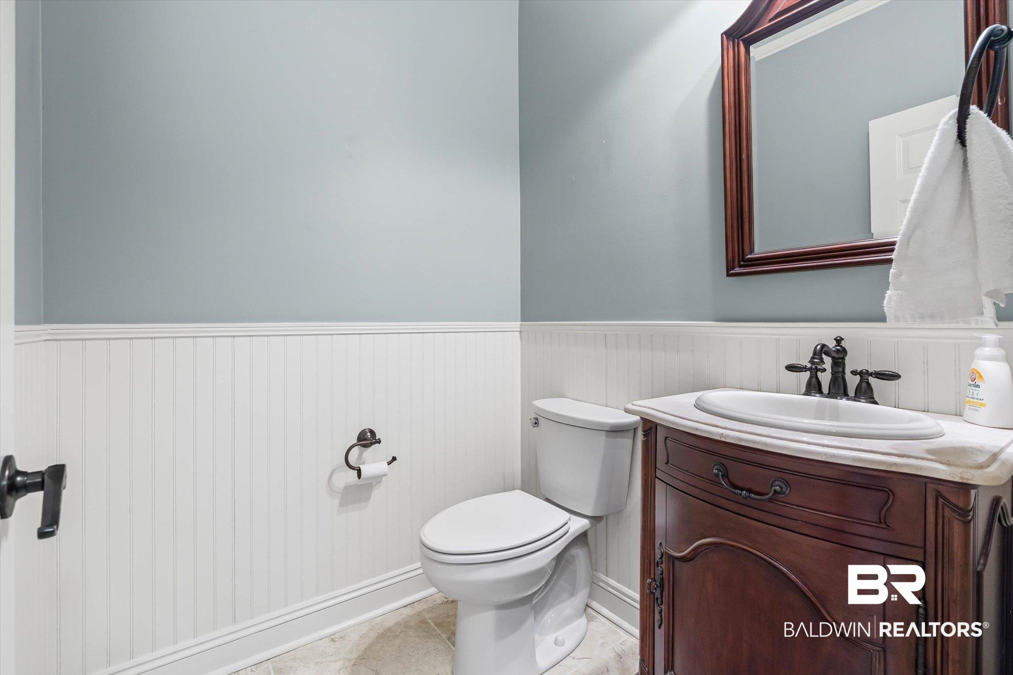 5270 Rodgers Road Eight Mile, AL 36613 - Photo 25 of 38 Half bathroom with a wainscoted wall, vanity, and tile patterned floors