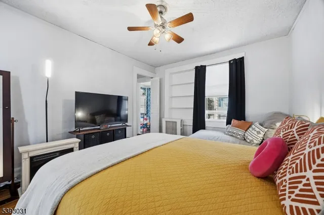 a view of a kitchen with a sink and a window