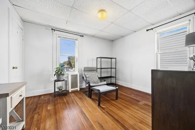 a bed room with a bed and a chandelier