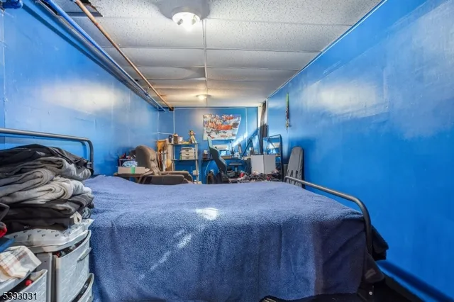 a view of a house with a yard and garage