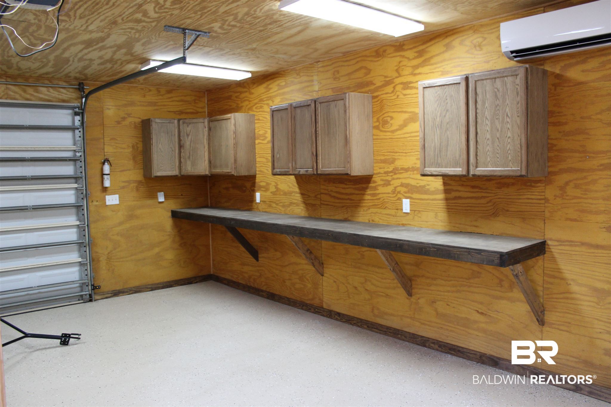 5187 Millhouse Road Gulf Shores, AL 36542 - Photo 12 of 49 Roll up Garage Door
