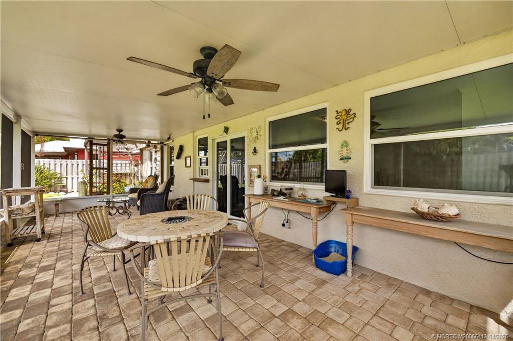 4844 Southeast Pilot Way Stuart, FL 34997 - Photo 19 of 50 a view of a dining room with furniture window and outside view