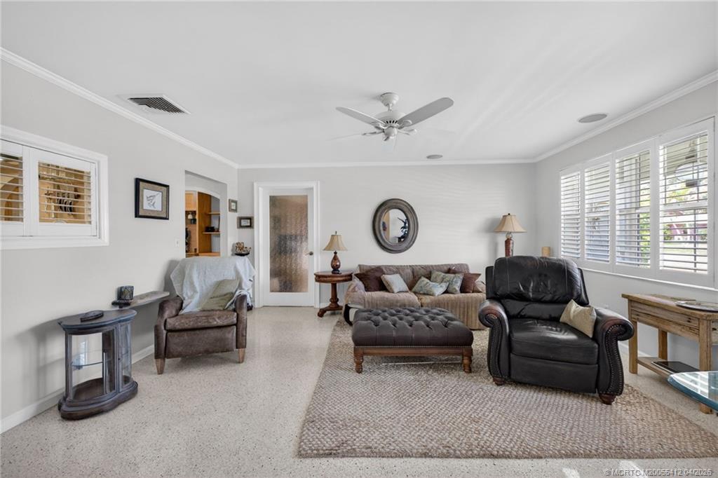 4844 Southeast Pilot Way Stuart, FL 34997 - Photo 25 of 50 a living room with furniture and a window