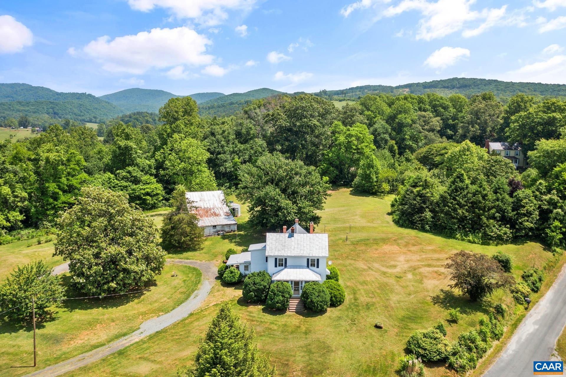 165 Shiloh Loop Faber, VA 22938 - Photo 1 of 33 a view of a swimming pool with a yard