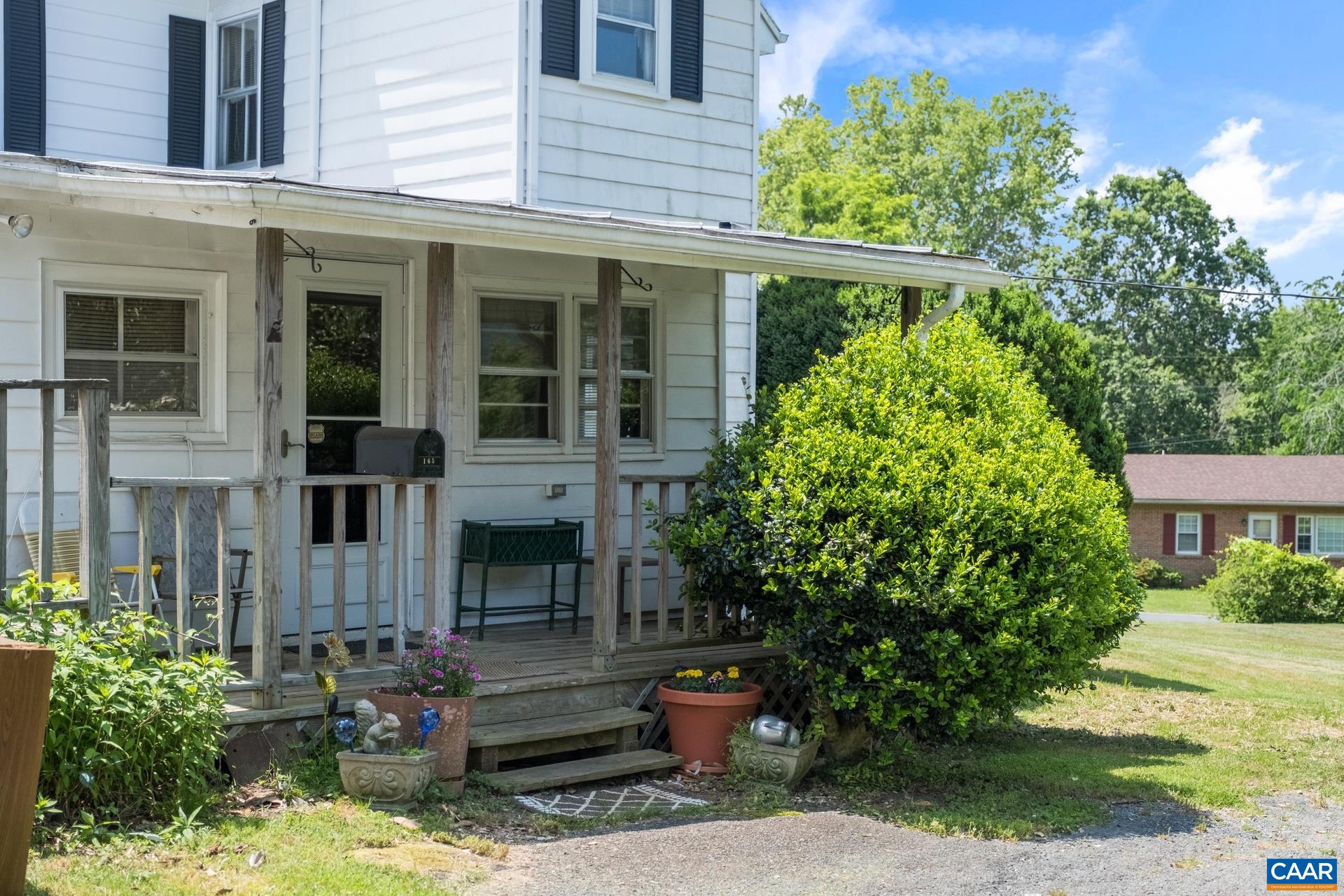 165 Shiloh Loop Faber, VA 22938 - Photo 11 of 33 front view of a house with a yard