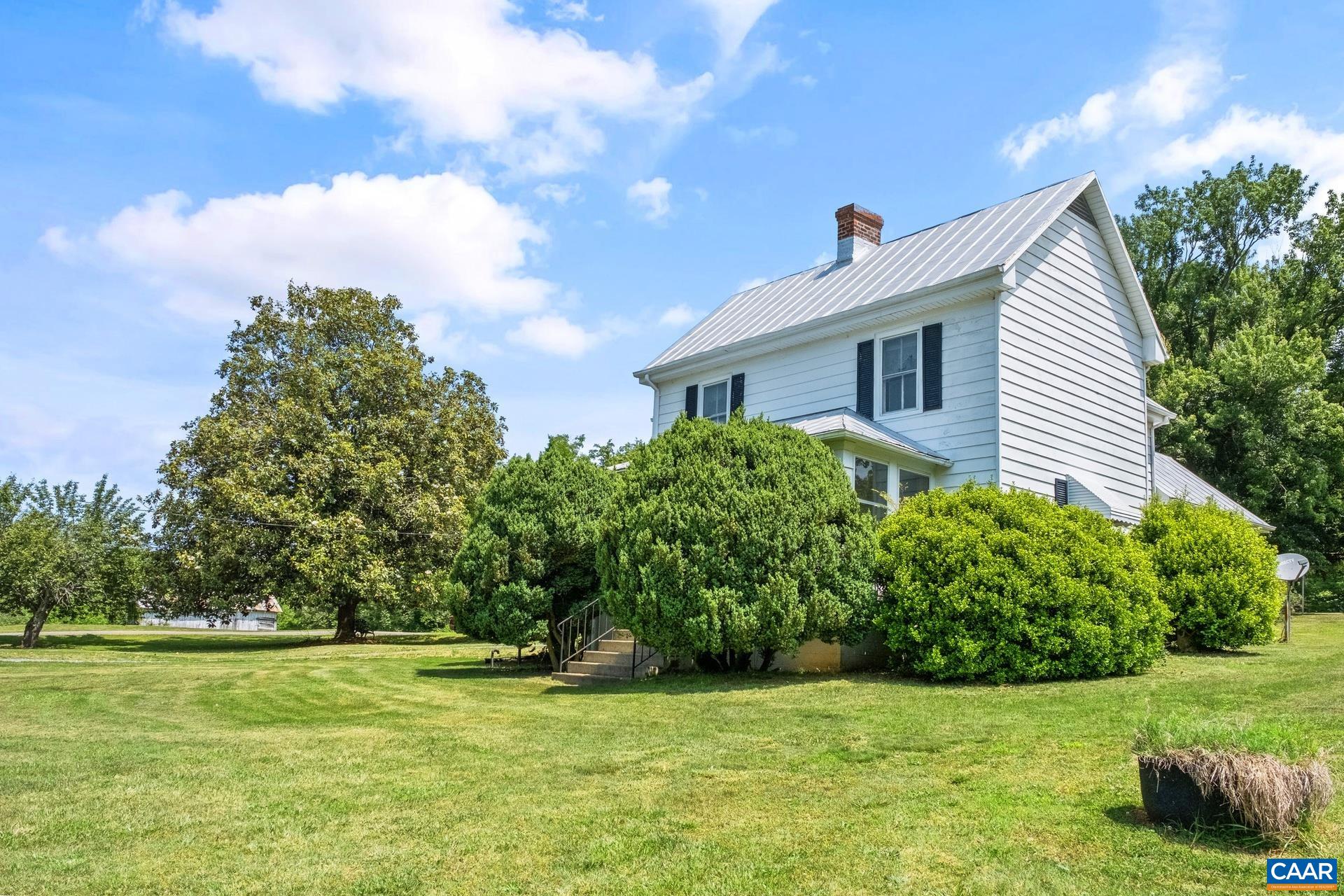 165 Shiloh Loop Faber, VA 22938 - Photo 12 of 33 a front view of a house with a yard