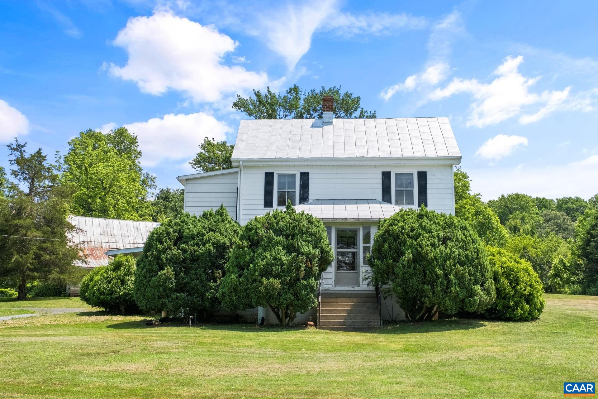 165 Shiloh Loop Faber, VA 22938 - Photo 2 of 33 a front view of a house with a yard
