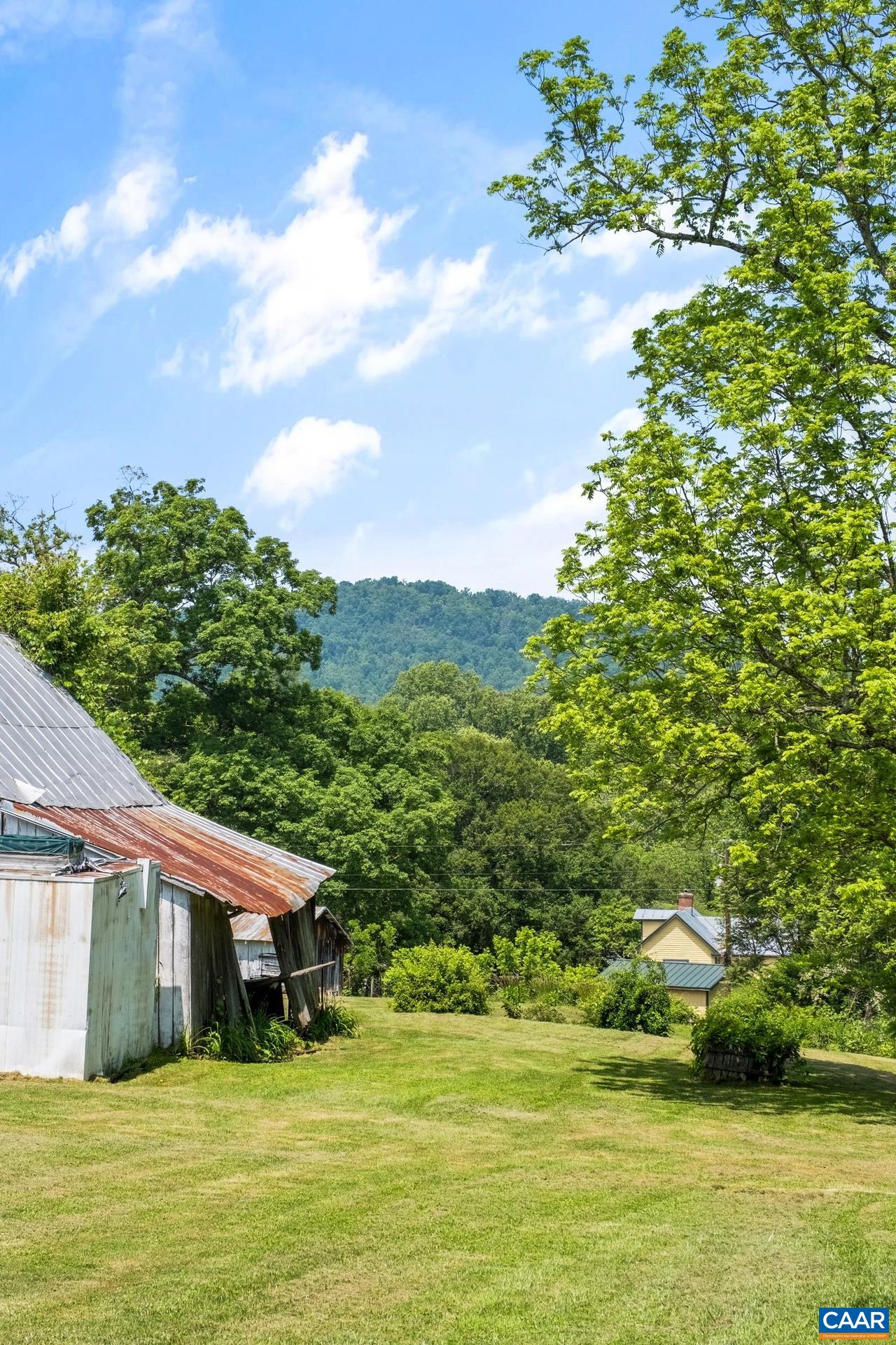 165 Shiloh Loop Faber, VA 22938 - Photo 32 of 33 a view of a house with a big yard
