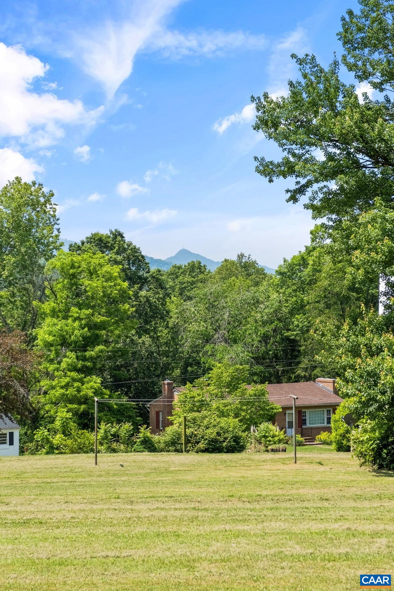 165 Shiloh Loop Faber, VA 22938 - Photo 33 of 33 a swimming pool with an outdoor seating
