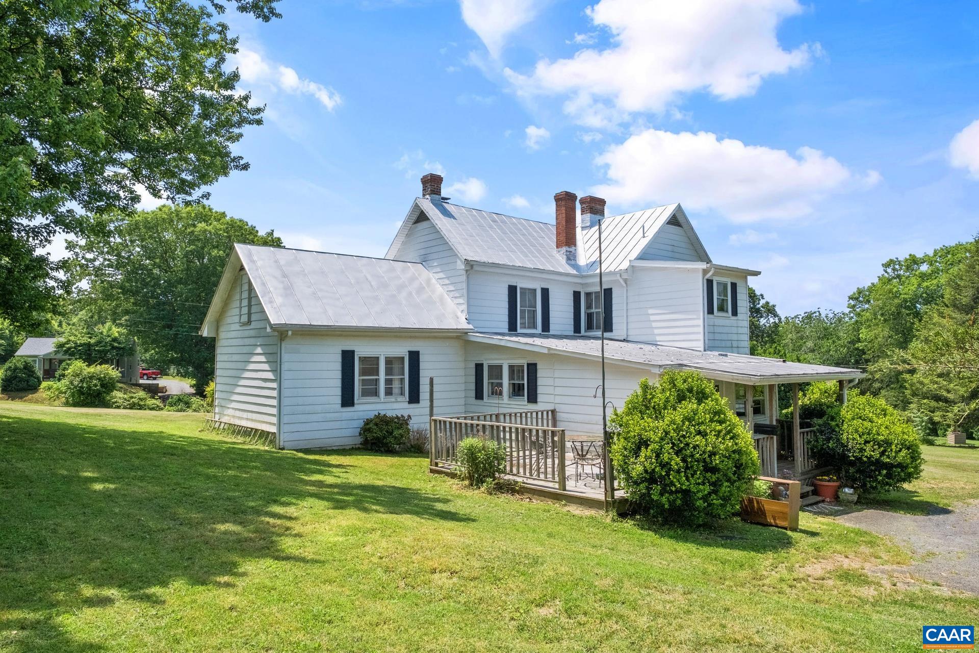 165 Shiloh Loop Faber, VA 22938 - Photo 4 of 33 a front view of a house with a yard
