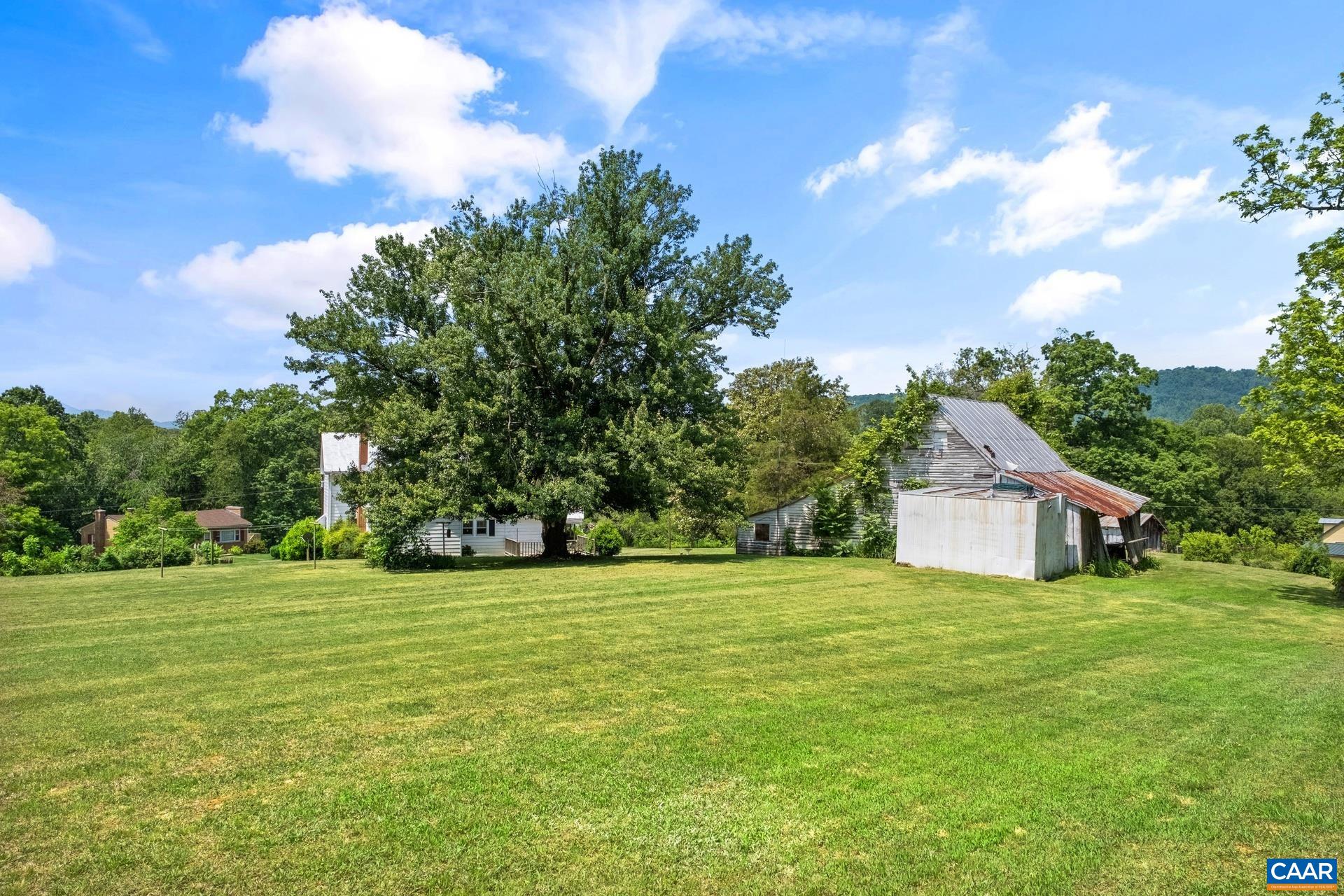 165 Shiloh Loop Faber, VA 22938 - Photo 7 of 33 a house with a garden