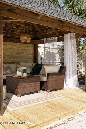 a living room with a couch and a table