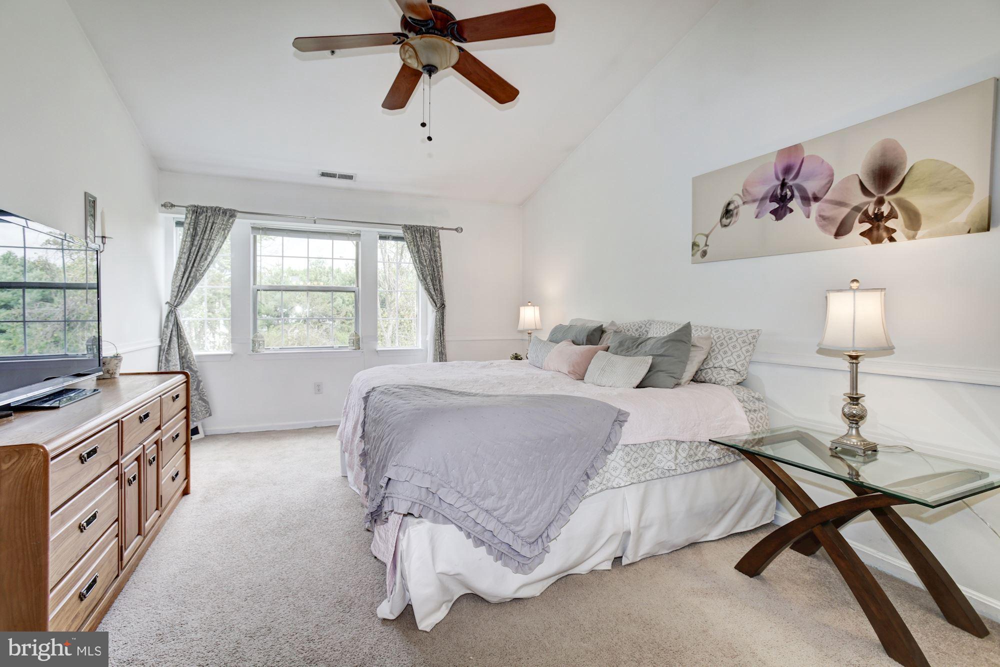8611 Falls Run Road, Unit K Ellicott City, MD 21043 - Photo 12 of 22 Master bedroom with large windows.