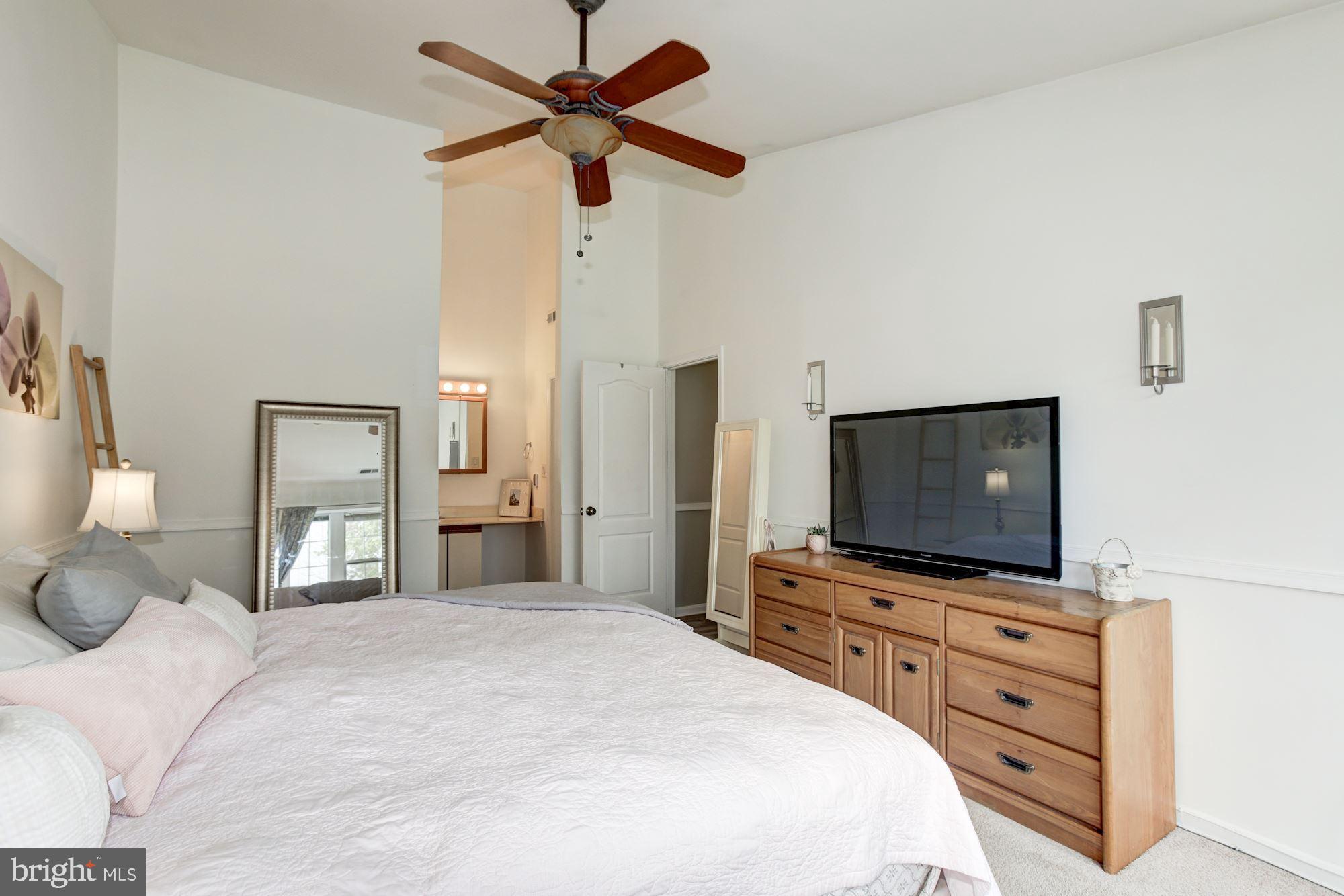 8611 Falls Run Road, Unit K Ellicott City, MD 21043 - Photo 15 of 22 Master bedroom with walk-in closet.