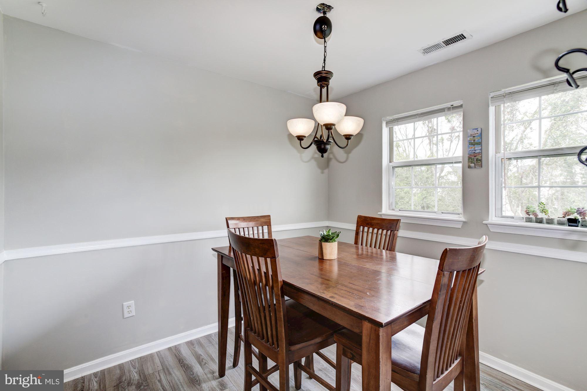 8611 Falls Run Road, Unit K Ellicott City, MD 21043 - Photo 9 of 22 Dining room with natural light.