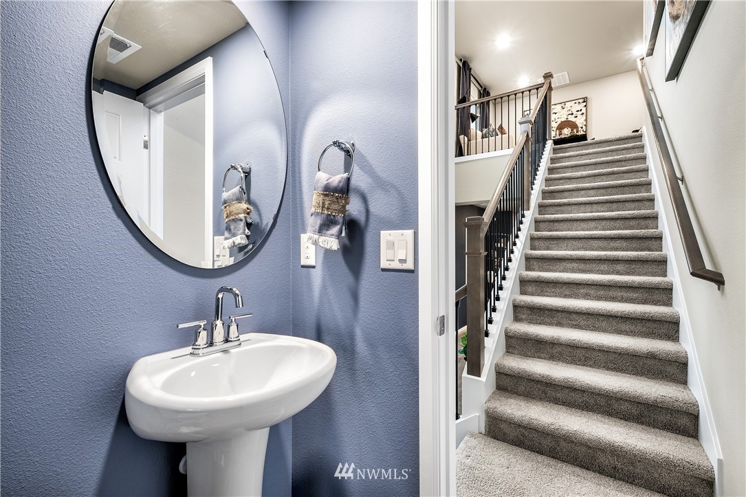 19418 9th Avenue Southeast, Unit 10 Bothell, WA 98012 - Photo 4 of 11 a bathroom with a sink and mirror