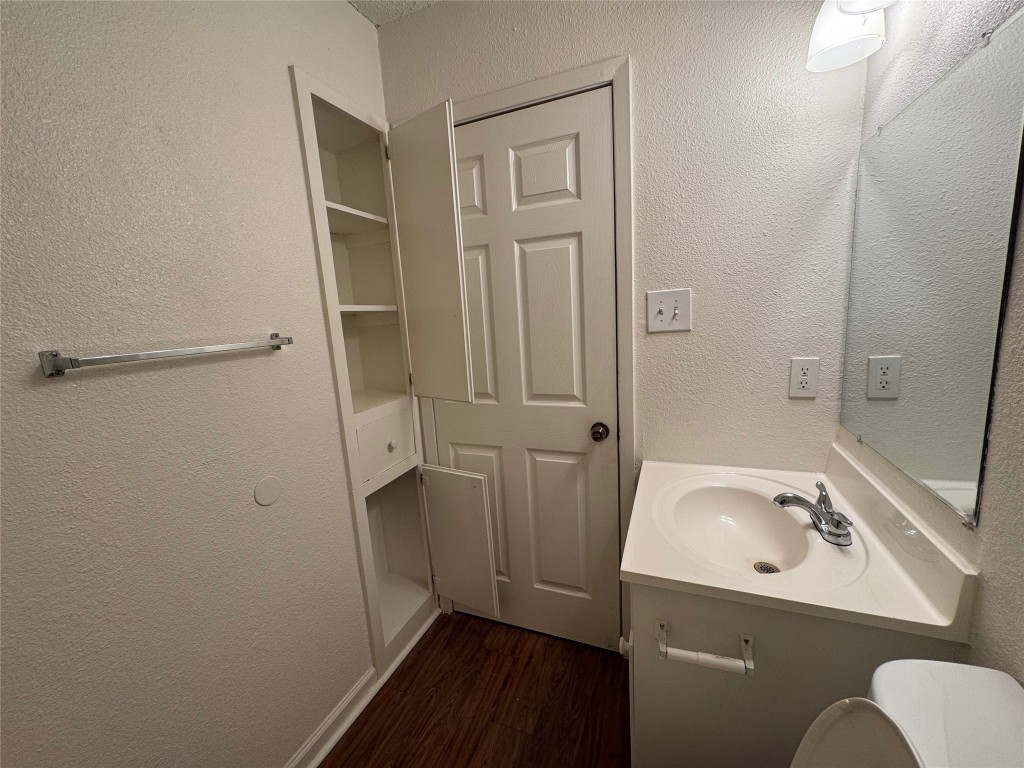 4904 West Wind Trail, Unit 102 Austin, TX 78745 - Photo 12 of 23 a bathroom with a sink and shower