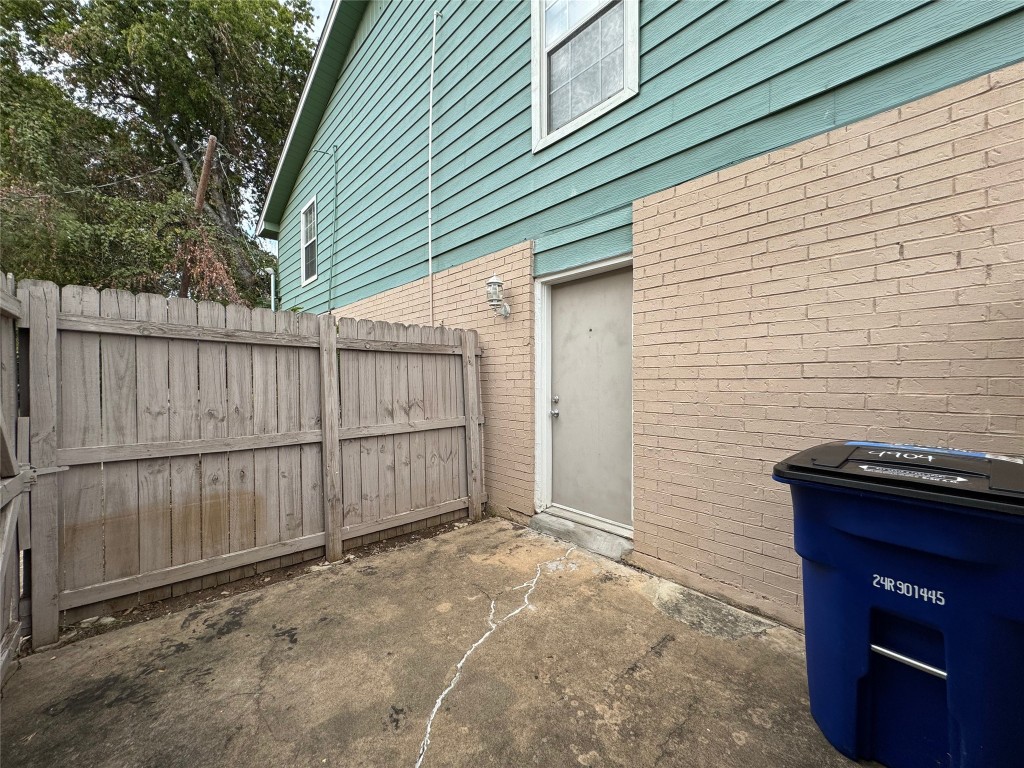 4904 West Wind Trail, Unit 102 Austin, TX 78745 - Photo 21 of 23 a view of a backyard