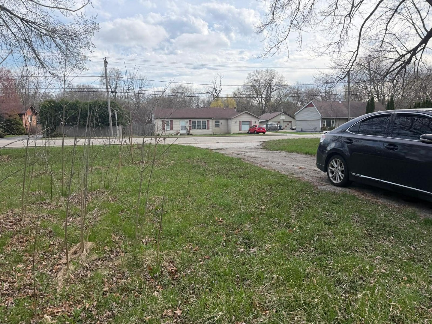 10802 West Yorkhouse Road Beach Park, IL 60087 - Photo 11 of 66 a view of a car park in front of a house
