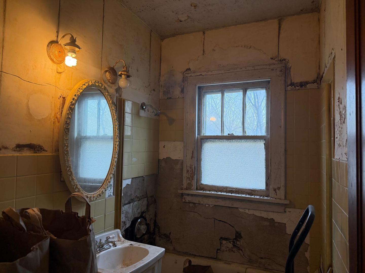 10802 West Yorkhouse Road Beach Park, IL 60087 - Photo 17 of 66 a bathroom with a sink mirror and toilet