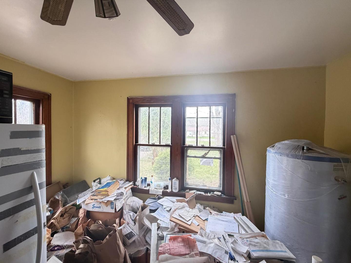10802 West Yorkhouse Road Beach Park, IL 60087 - Photo 32 of 66 a bed room with a bed and a window