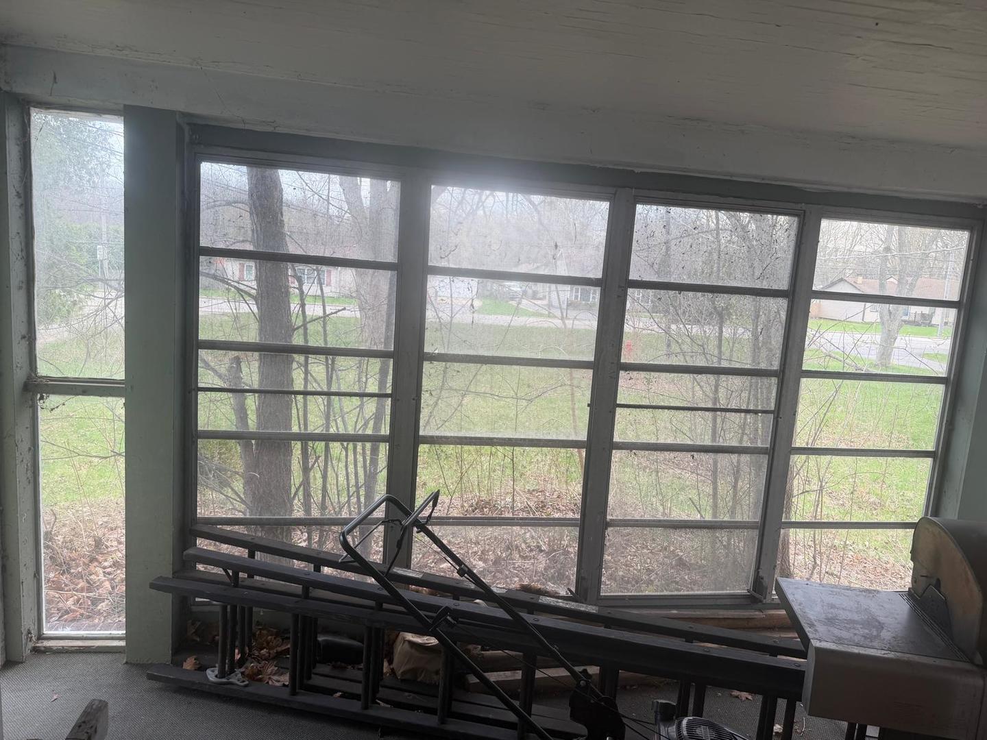 10802 West Yorkhouse Road Beach Park, IL 60087 - Photo 35 of 66 a room with wooden table and chairs