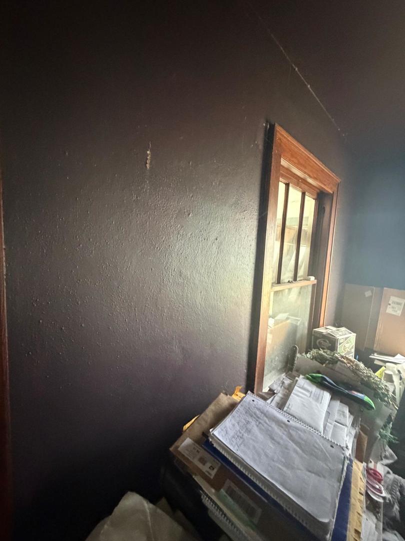 10802 West Yorkhouse Road Beach Park, IL 60087 - Photo 36 of 66 a bedroom with a bed and wooden floor