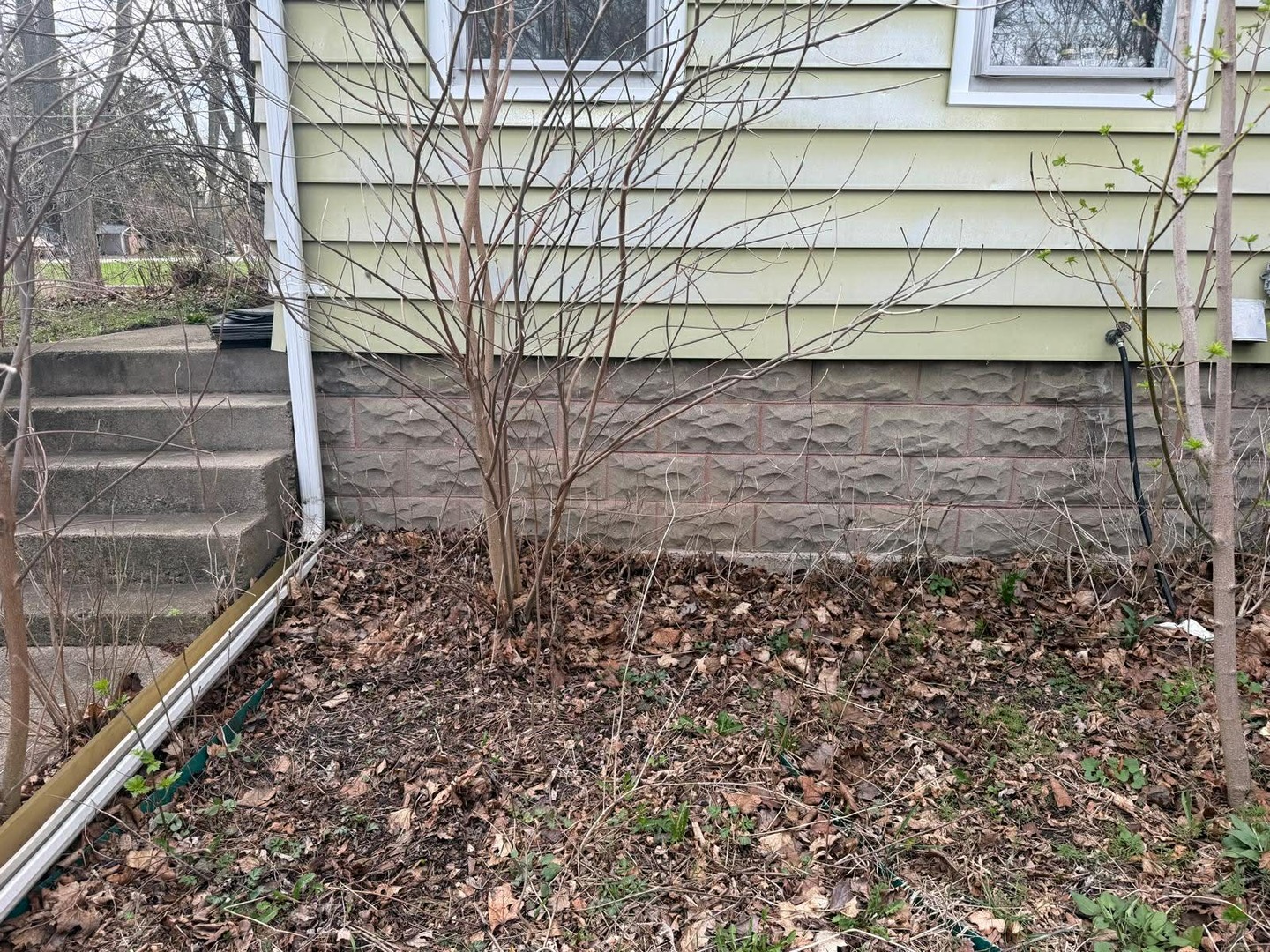10802 West Yorkhouse Road Beach Park, IL 60087 - Photo 9 of 66 a brick building with a bench in front of it