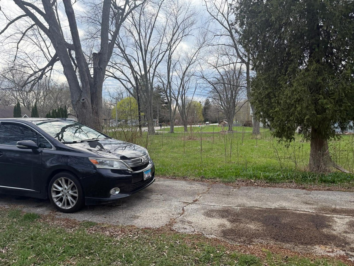 10802 West Yorkhouse Road Beach Park, IL 60087 - Photo 10 of 66 a view of a car parked in a yard
