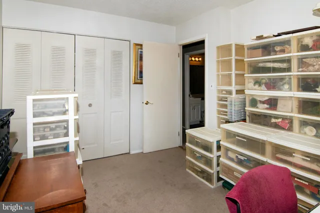 a room with a bed and a window