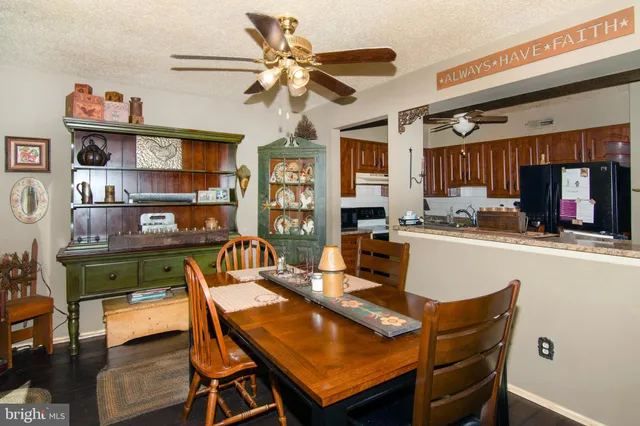 a view of a dining room with furniture