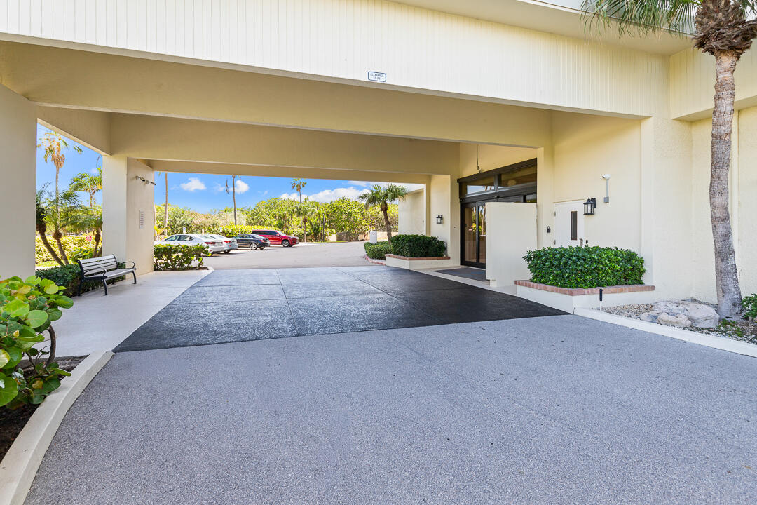 400 Ocean Trail Way, Unit 1108 Jupiter, FL 33477 - Photo 36 of 41 a living room with furniture and a large window