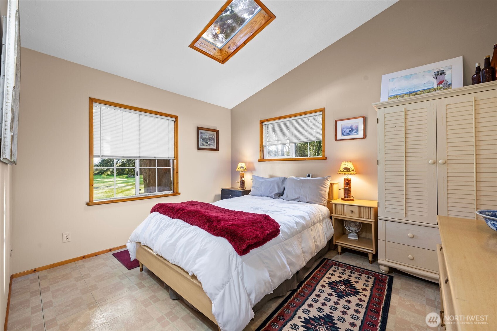 471 Barr Road Grays River, WA 98621 - Photo 16 of 40 a bedroom with bed and a window