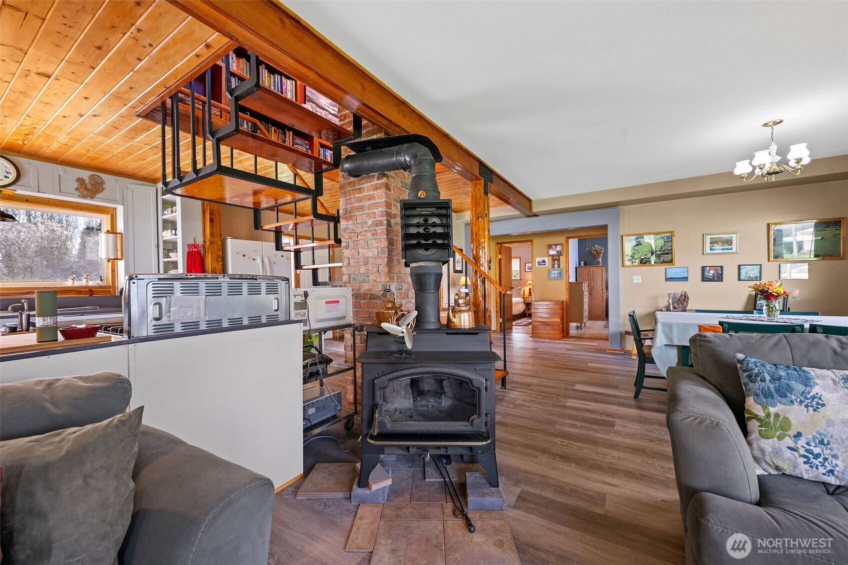 471 Barr Road Grays River, WA 98621 - Photo 19 of 40 a living room with furniture and a flat screen tv