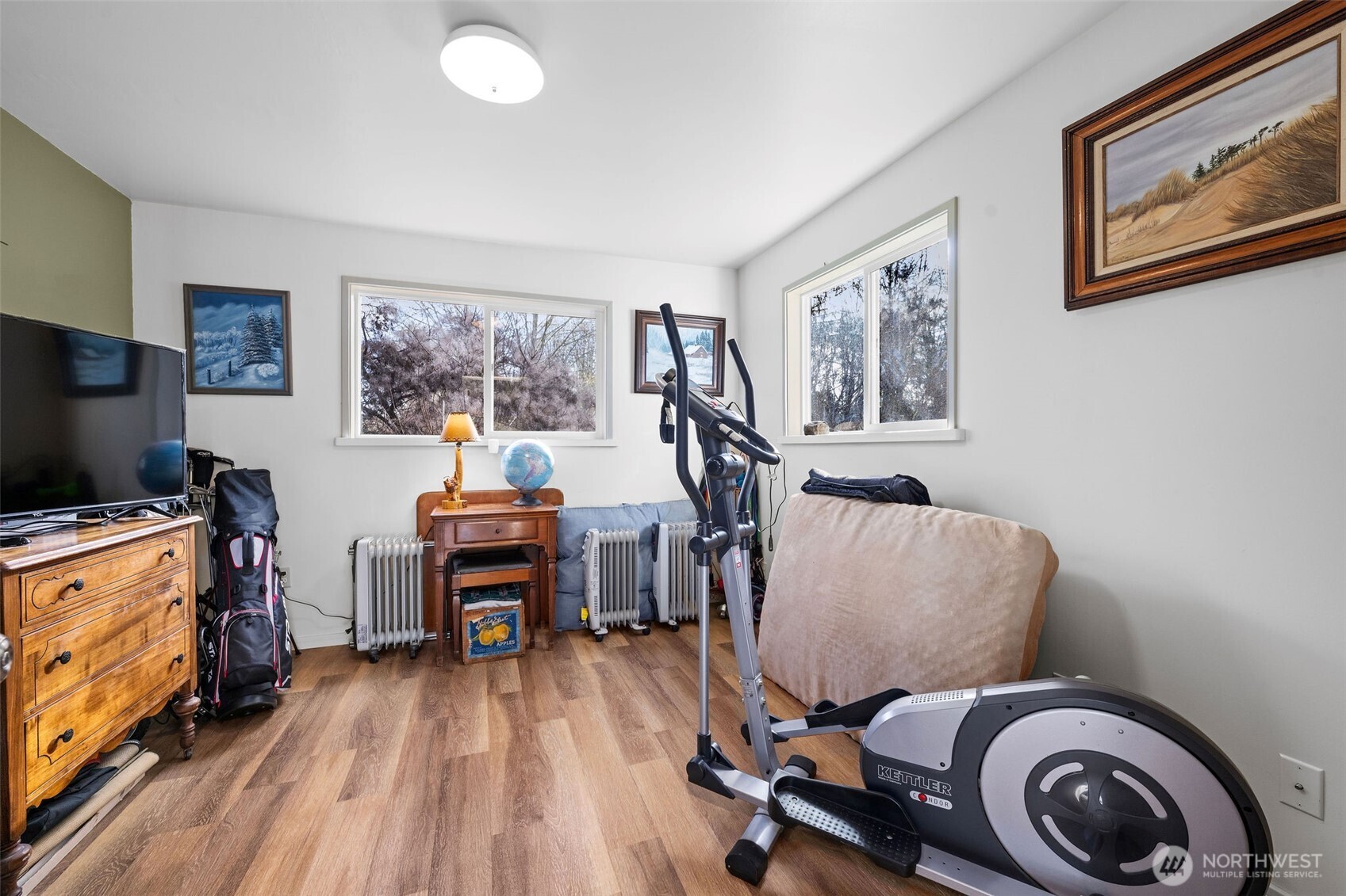 471 Barr Road Grays River, WA 98621 - Photo 24 of 40 a living room with furniture and a flat screen tv