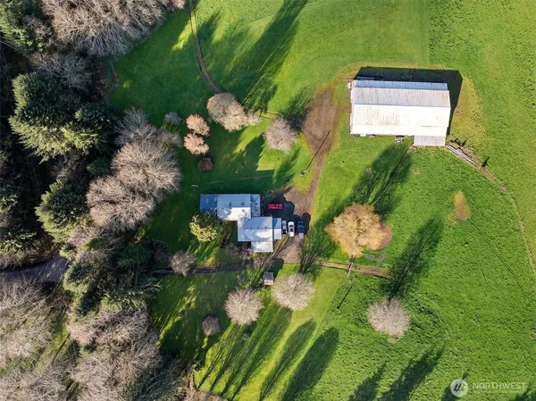 a backyard of a house with lots of green space