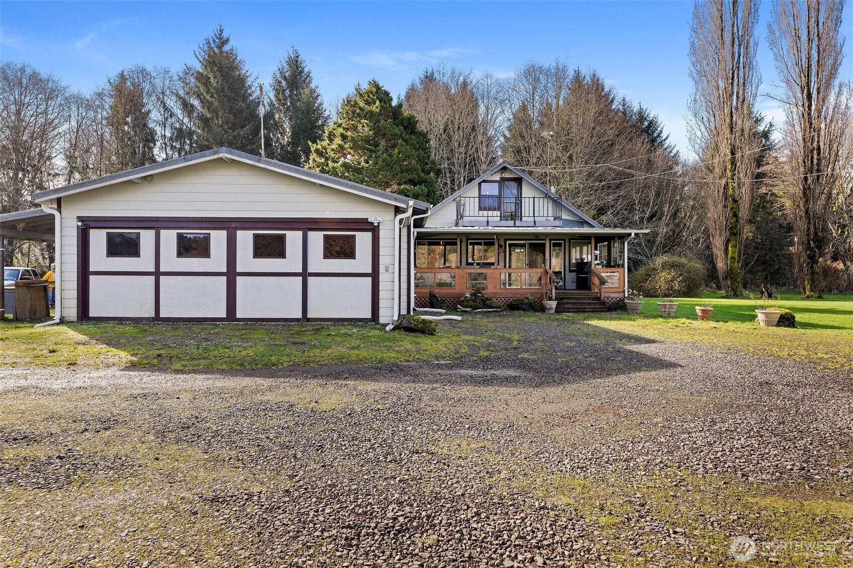471 Barr Road Grays River, WA 98621 - Photo 5 of 40 a front view of a house with a yard and trees