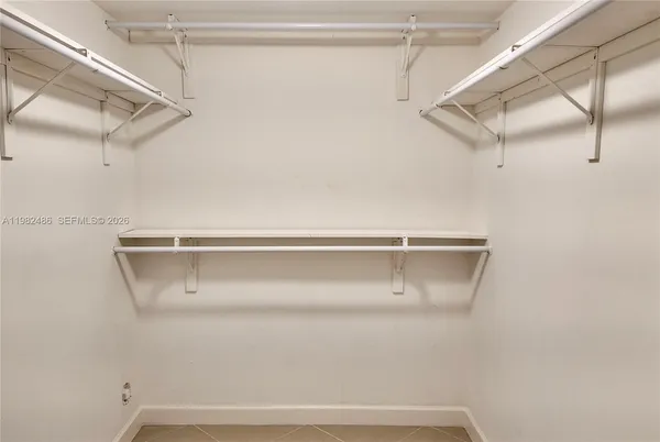 a view of a room with racks on the wall