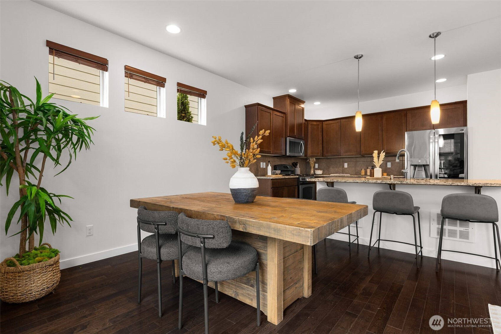 16516 2nd Park Southeast Bothell, WA 98012 - Photo 12 of 39 a kitchen with a table and chairs in it