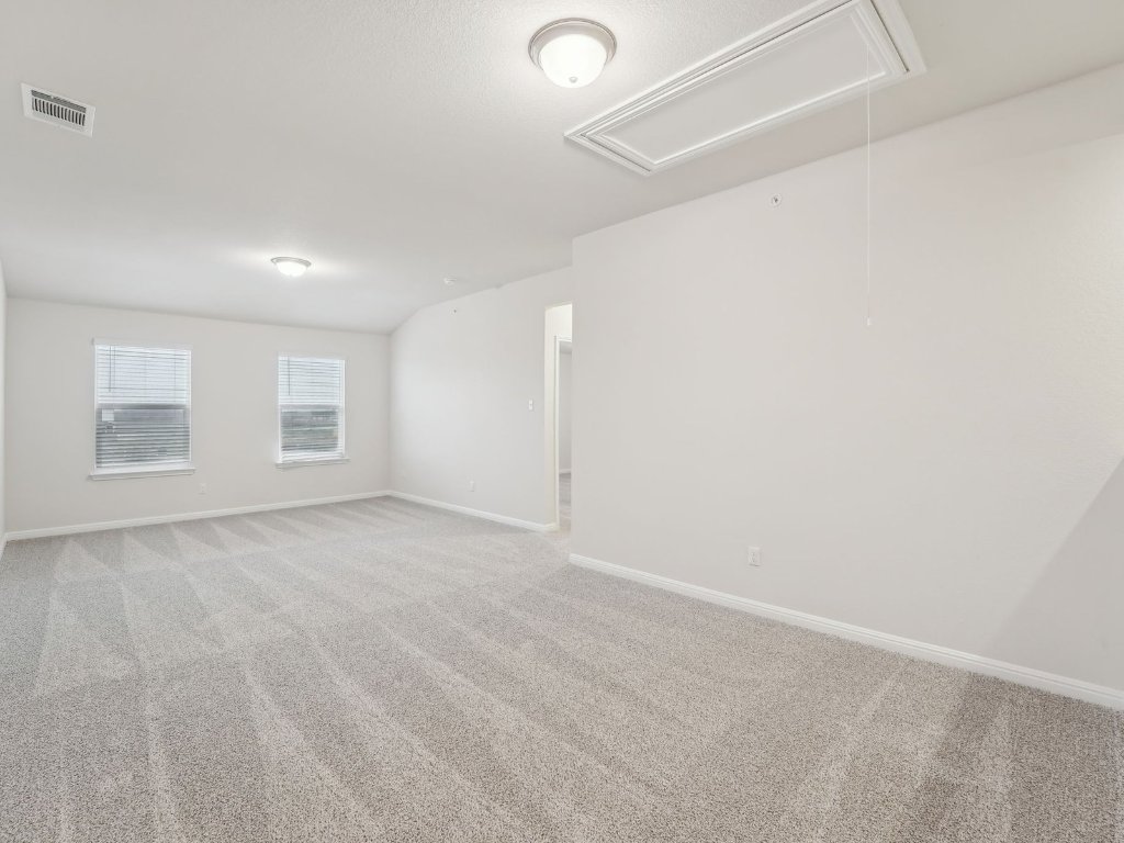 165 Calcite Road, Unit 1 Kyle, TX 78640 - Photo 6 of 15 a view of an empty room with a window