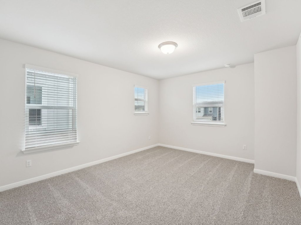 165 Calcite Road, Unit 1 Kyle, TX 78640 - Photo 9 of 15 an empty room with a window